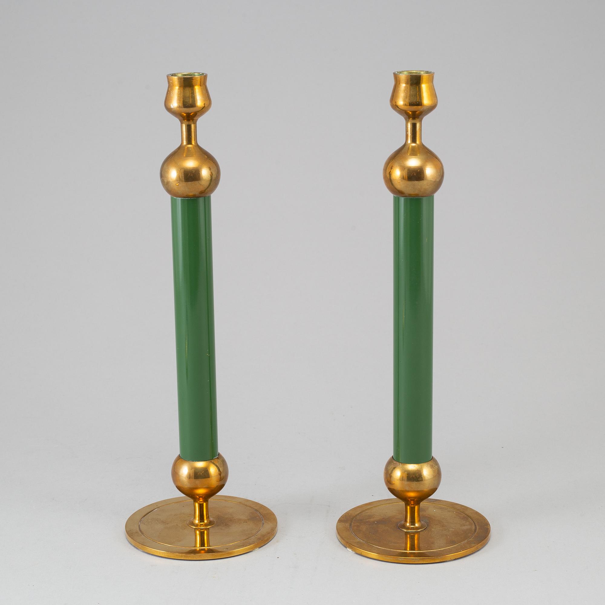 FIRMA SVENSKT TENN, a pair of Swedish 20th century  brass candlesticks marked Svenskt Tenn.