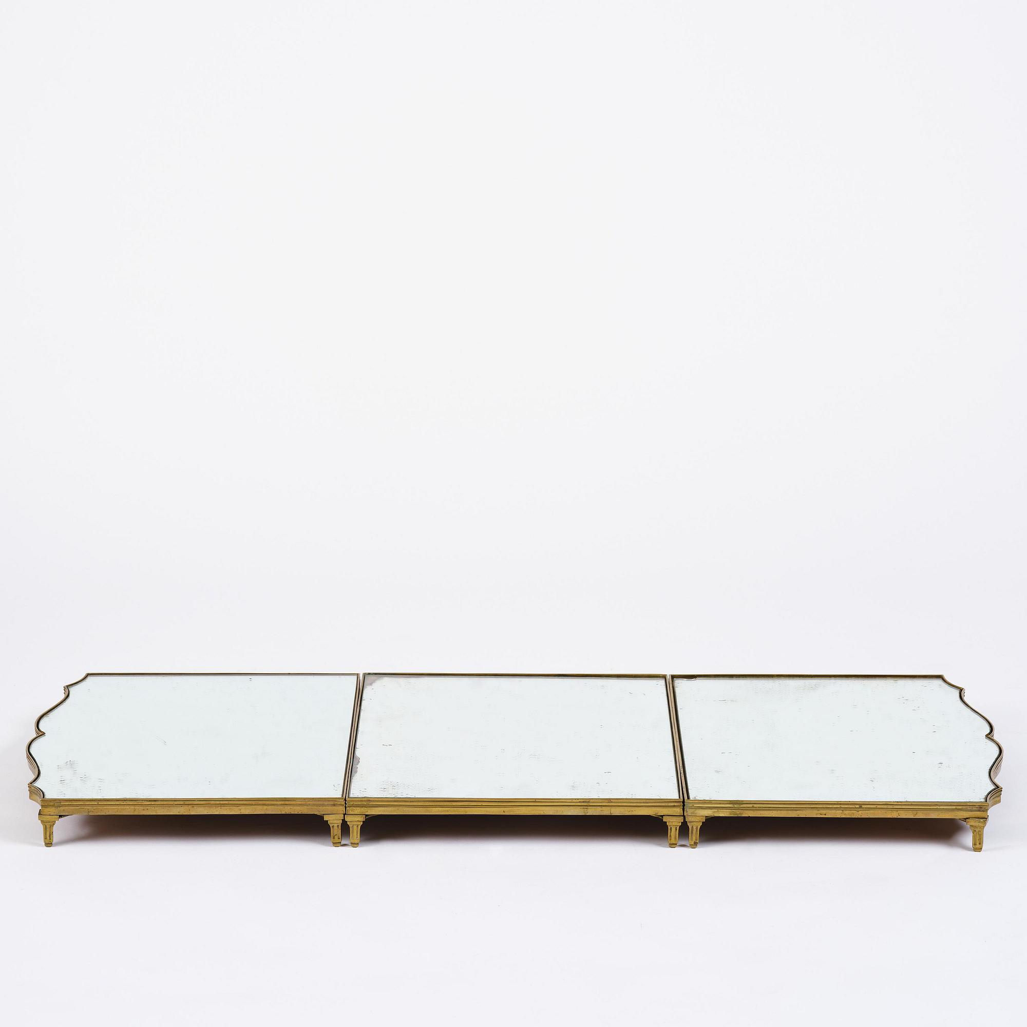 A Gustavian three-piece brass and glass surtout de table, Stockholm, later part 18th century.