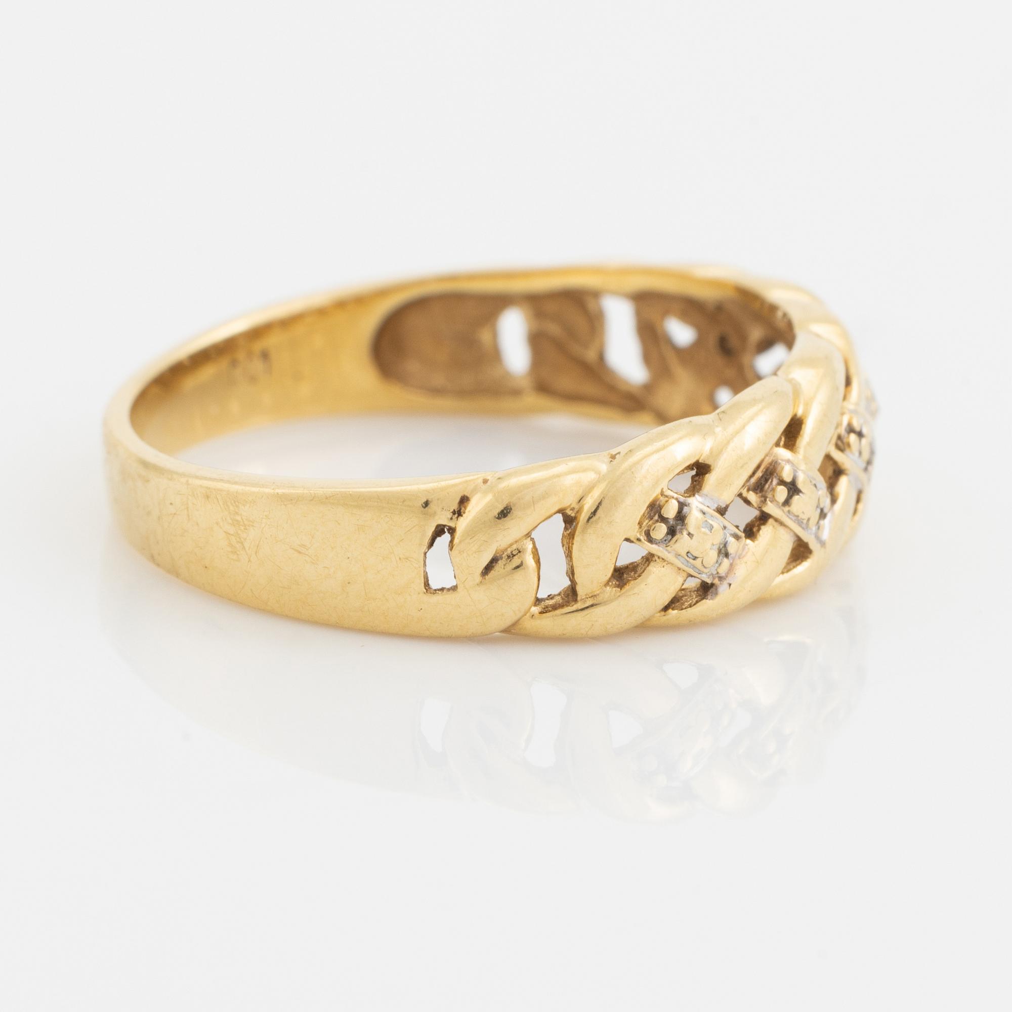 18K gold and small diamond ring.
