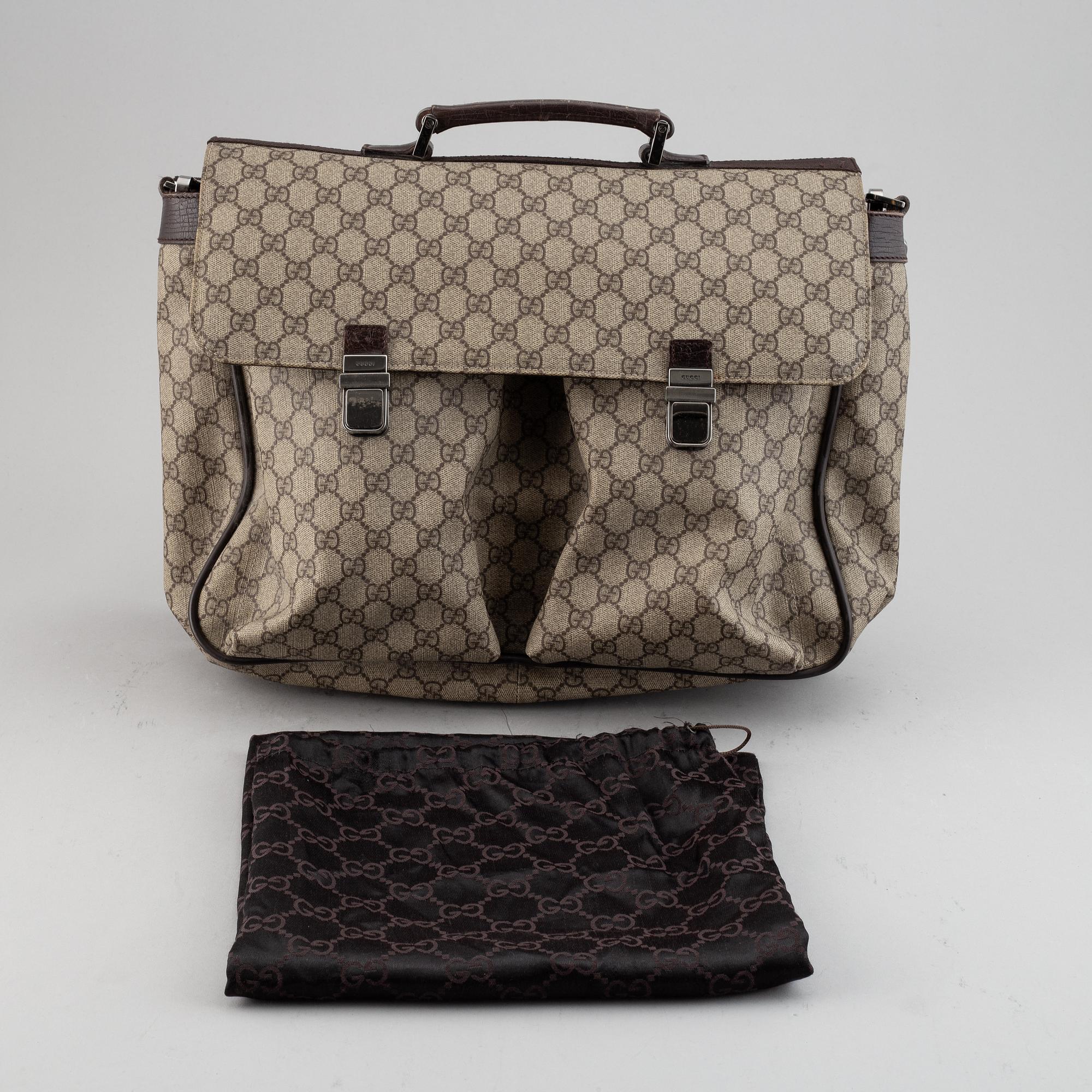 Gucci, a messenger bag.