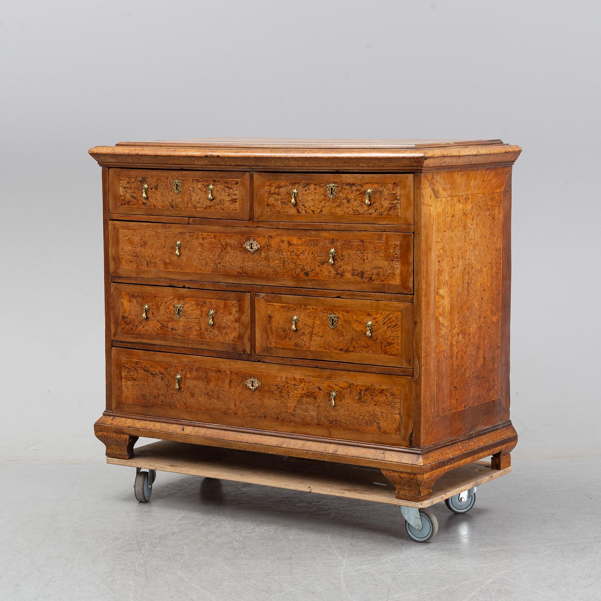 A Swedish root veneered late baroque chest of drawers, first half of the 18th century.