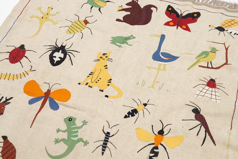 A hand-embroidered kilim rug, c. 171 x 123 cm.