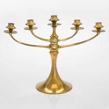 A Jugend brass candlelabra, early 20th century,