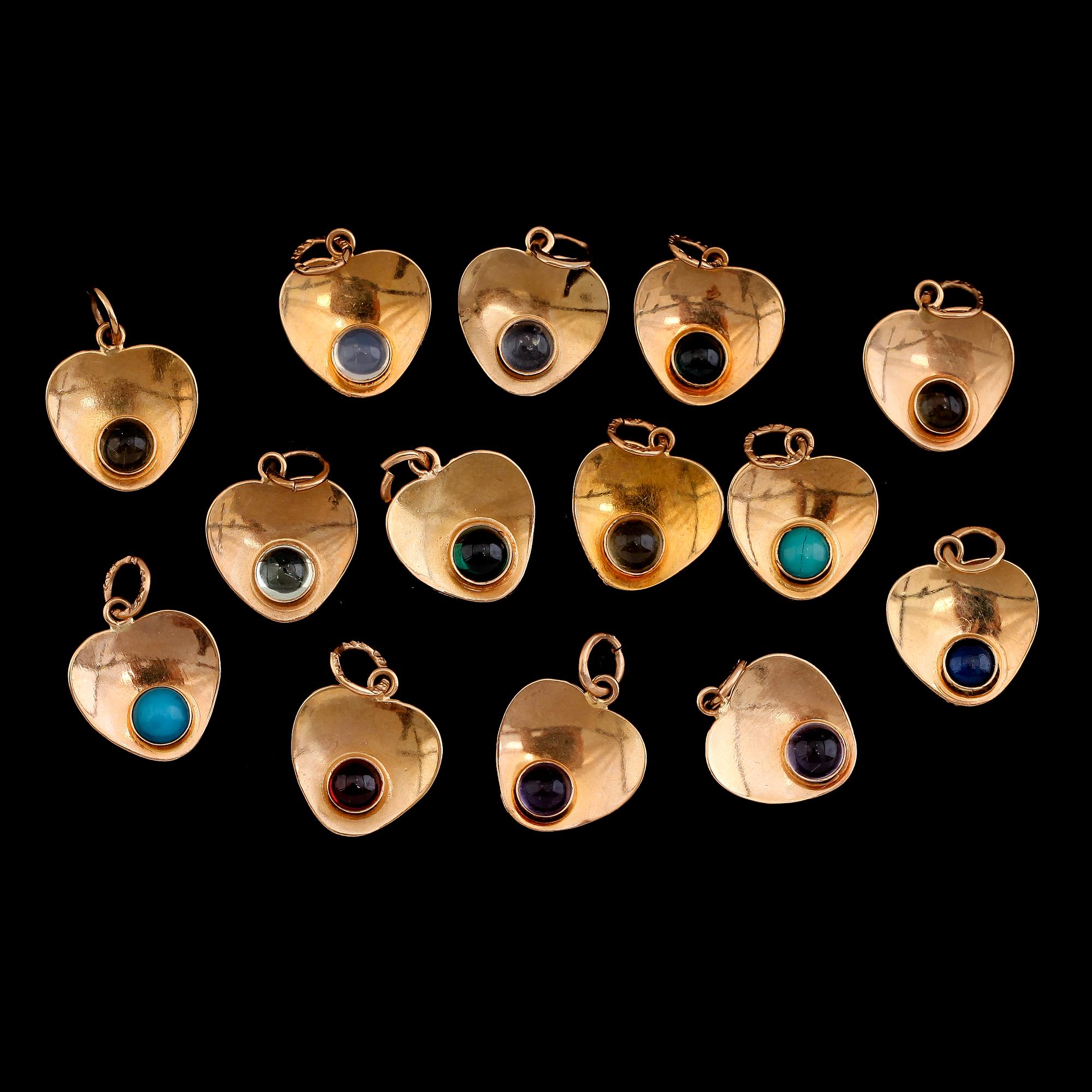 BERLOCKER, 14 st, 18 k guld med olika stenar. Total vikt ca 7 gram.