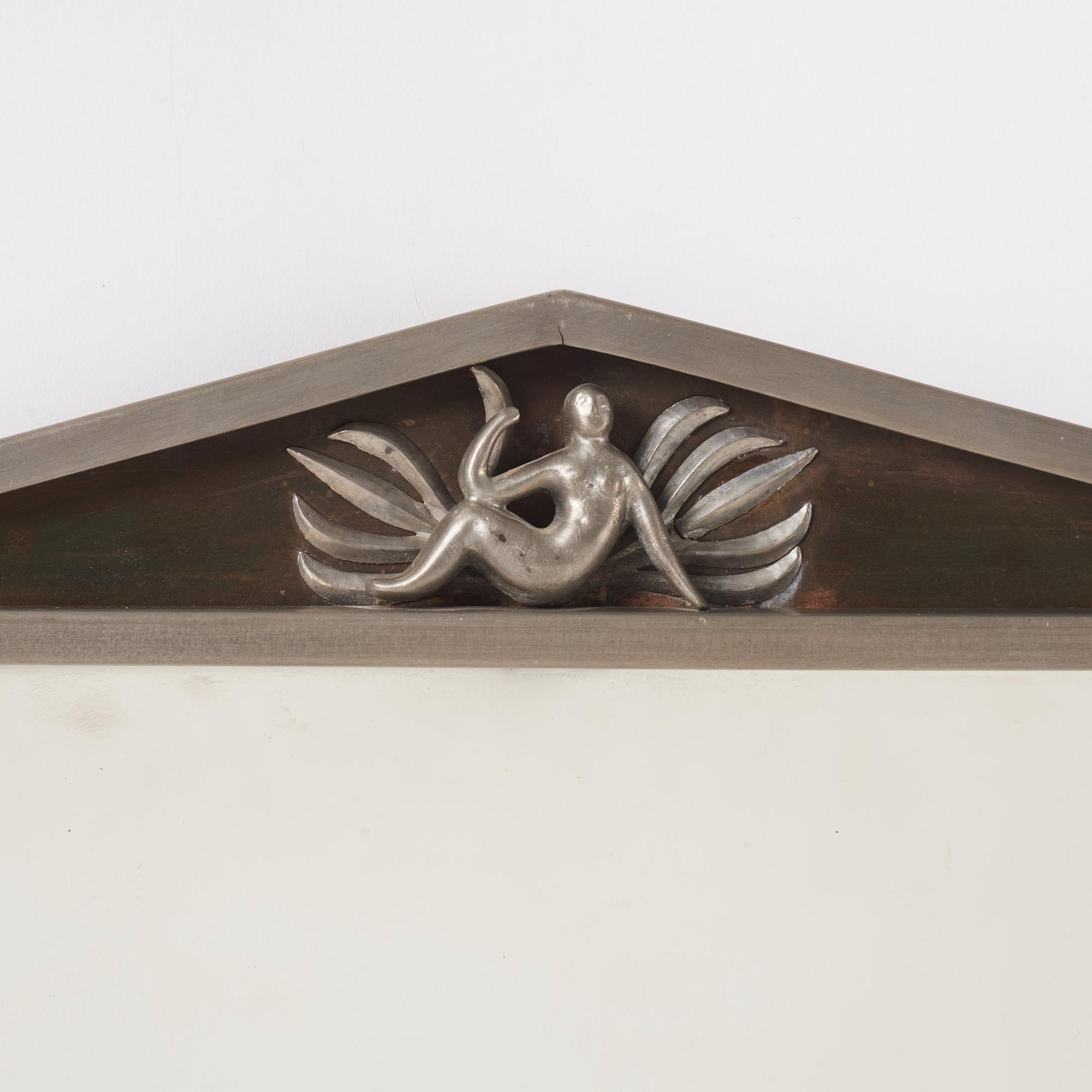 Nils Fougstedt, a Swedish Grace pewter and brass mirror model "137 a", Firma Svenskt Tenn, Stockholm 1927.