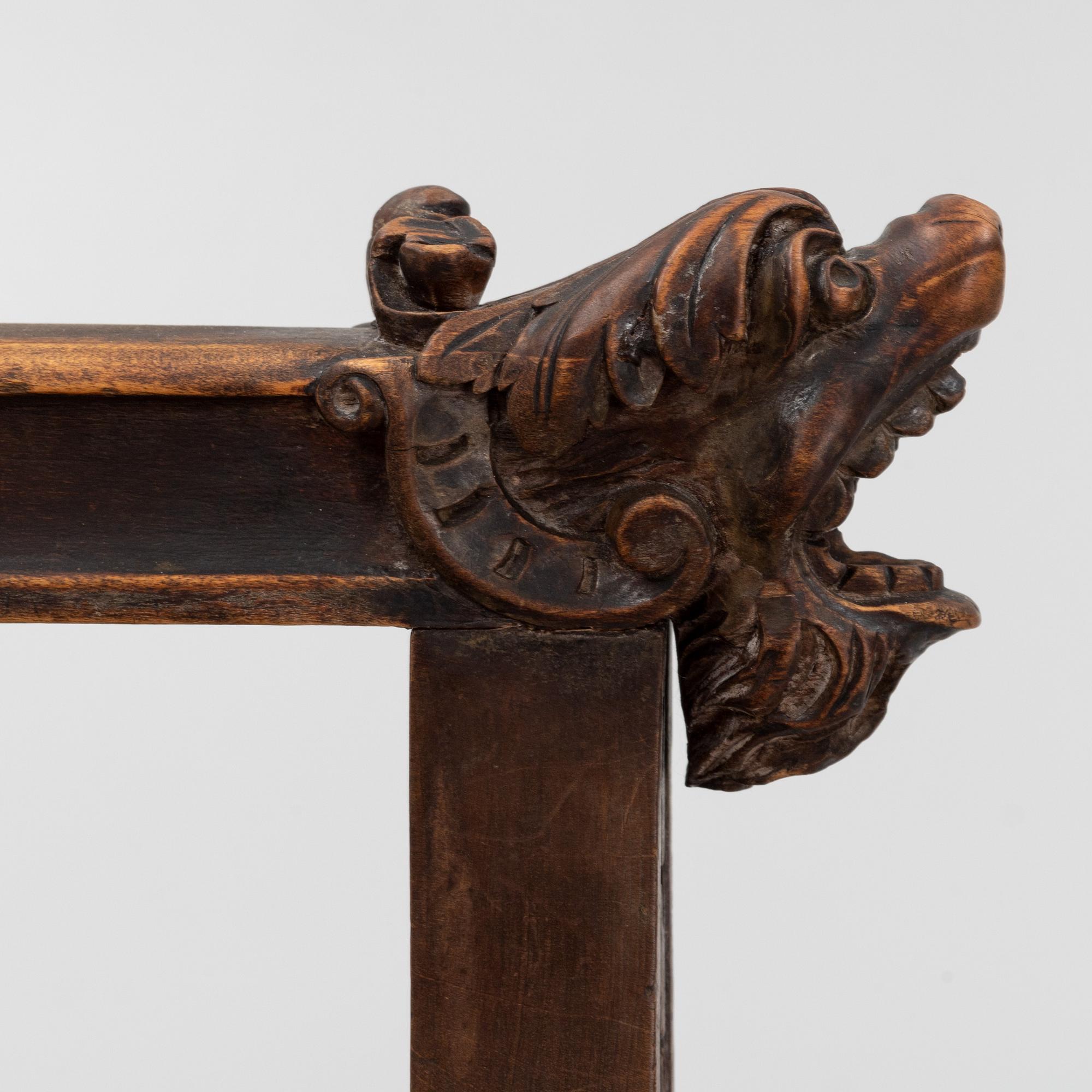 A carved Renaissace style armchair, late 19th Century.