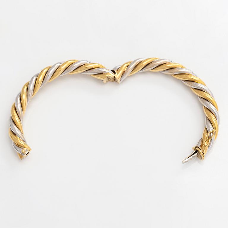 An 18K gold/white gold bracelet, Switzerland.