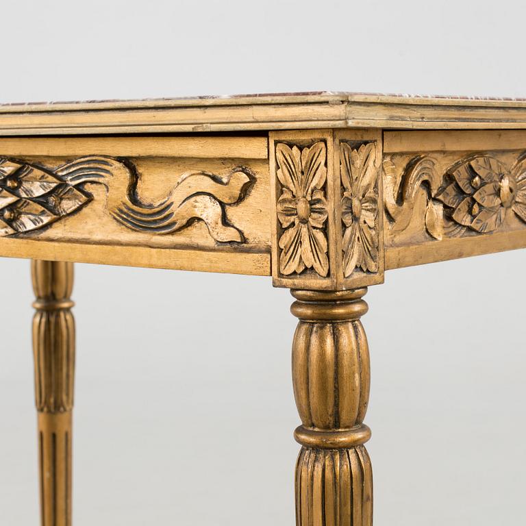 A Louis XVI-style table, first half of the 20th century.