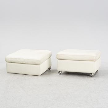 A pair of leather upholstered foot stools, Dux, later part of the 20th Century.