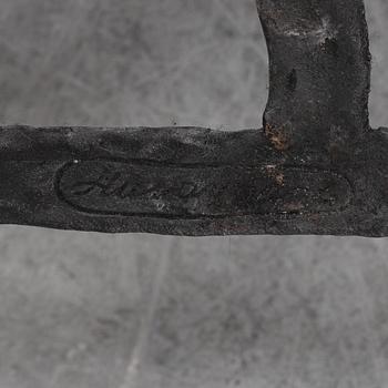 A cast iron fire place screen, Olle Hermansson, Husqvarna, from the second half of the 20th century.