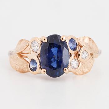 Sapphire and brilliant-cut diamond ring.