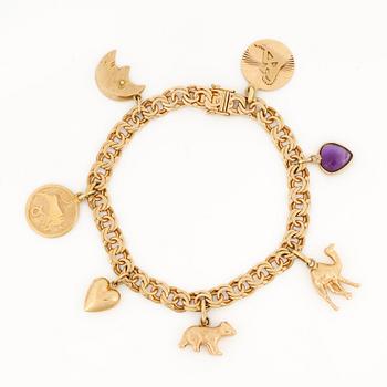 ARMBAND, 18 k guld, med ametist, 1952. Totalvikt ca 21 gram.