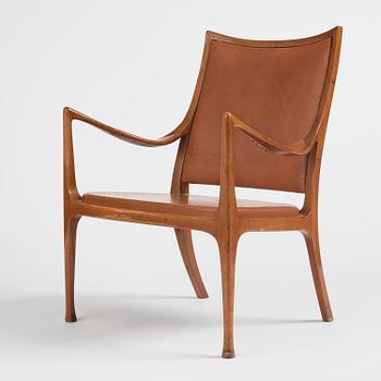 Hans Asplund, a walnut and leather easy chair, Nordiska Kompaniet, ca 1955, for the Nordiska Kompaniet beauty salon.