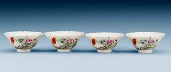 1659. A set of four famille rose bowls, late Qing dynasty with Guangxus six character mark.