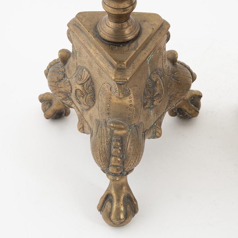 A pair of Baroque-style bronze candlesticks, 19th Century.