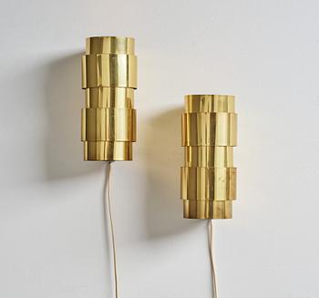 A pair of 'Aristokrat' brass wall lights, Fröseke AB Nybrofabriken, 1960's.