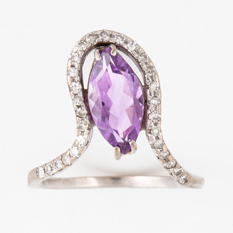 Mandelstam, Ring 18K white gold set with a marquise-cut amethyst and single-cut diamonds.