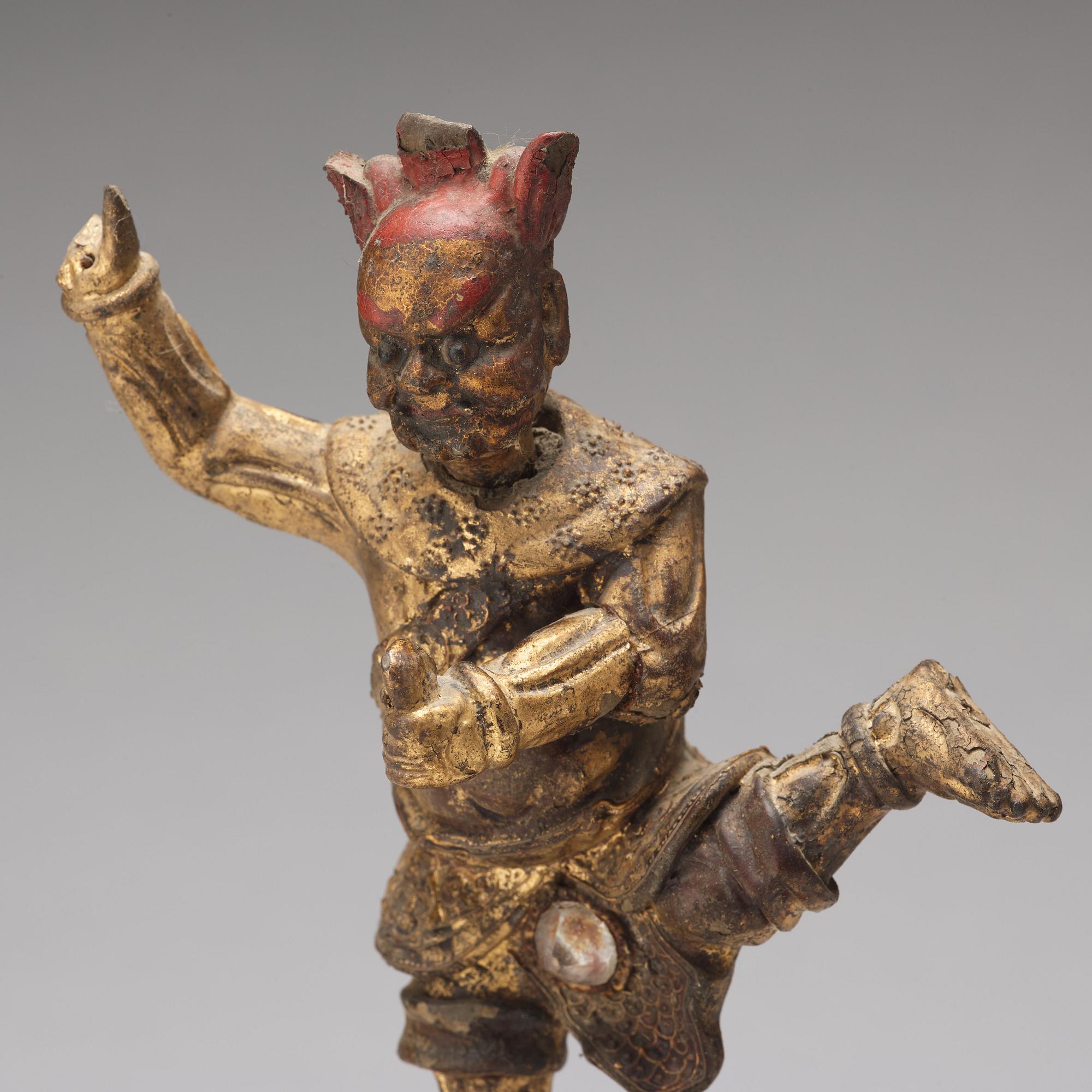 A gilt lacquer sculpture of deity, Qing dynasty, 18th Century.