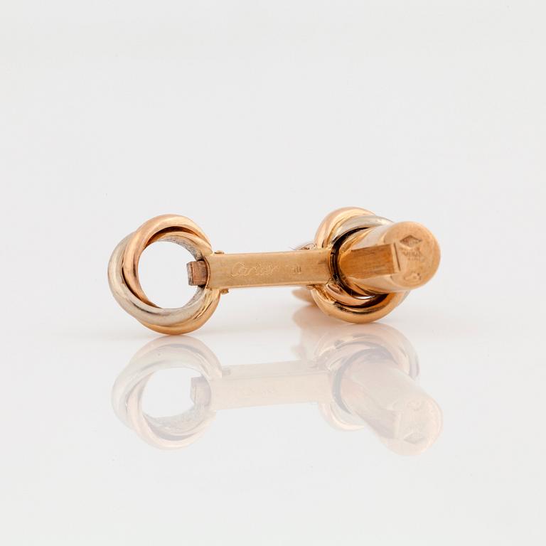 A pair of cufflinks signed Cartier with changeable  details in different gemstones.