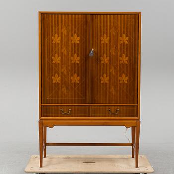 A mid 20th Century bar cabinet.