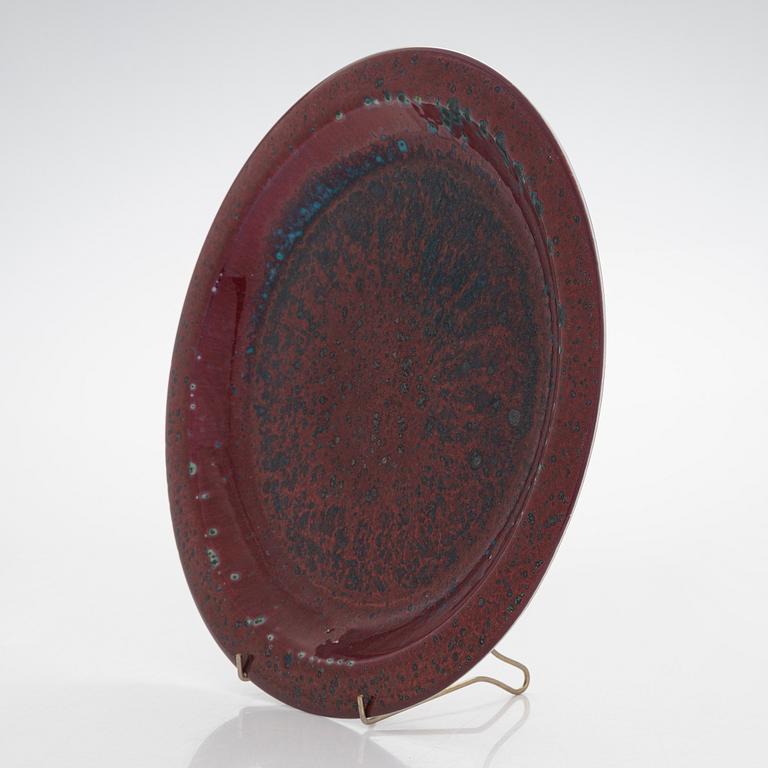 Toini Muona, a ceramic dish signed TM ARABIA.