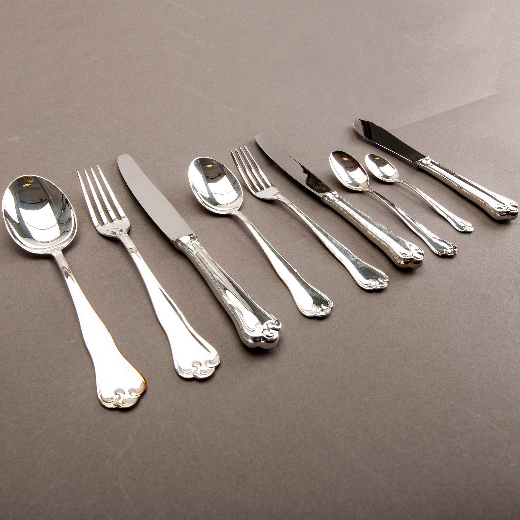 A Swedish 20th century set of 99 silver cutlery mark of Mema Linköping 1982, weight including cartoons 3140 gr.