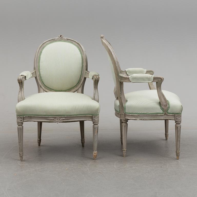 A pair of Gustavian style armchairs, 20th century.