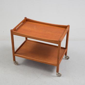 A mid 20th century teak serving trolley by Hans J Wegner, Andr. Tuck, Denmark.