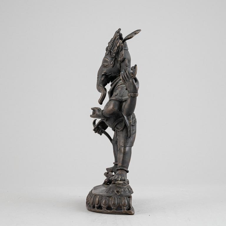 An Indian bronze figure of Ganesha, presumably 19th century.