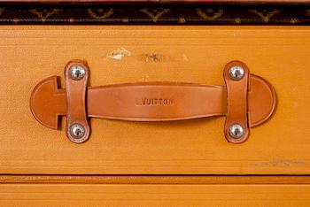 An early 20th cent monogram canvas trunk by Louis Vuitton.