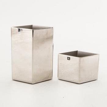 Sigurd Persson, a set of four metal signed vases.