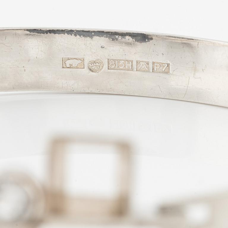 Bangle, Kultasepät Salovaara, silver with white synthetic stones. Turku/Åbo 1968.