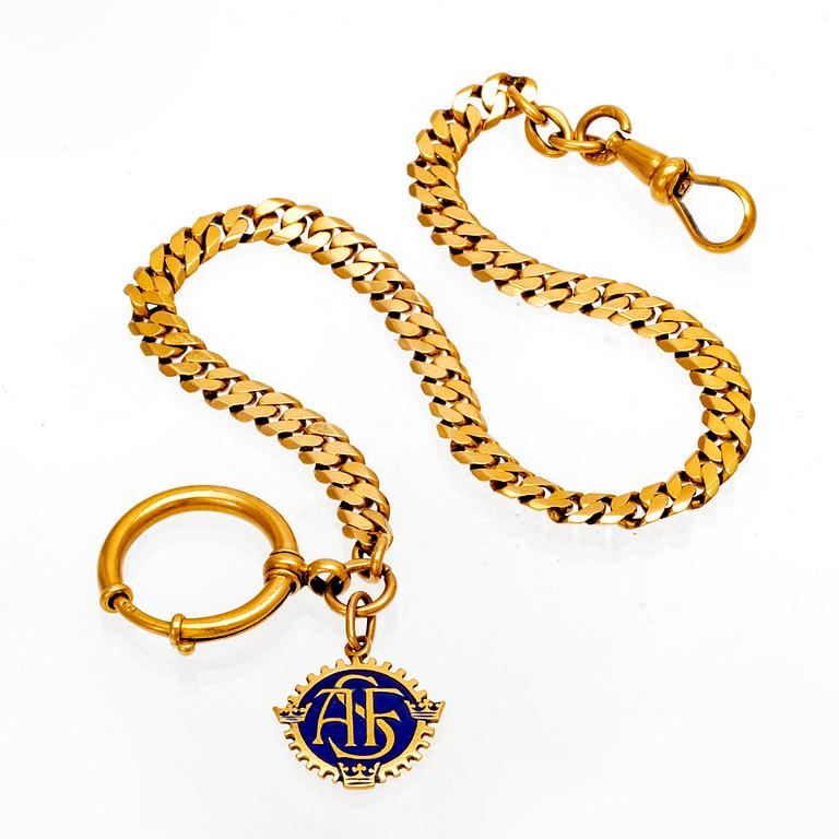 An 18K gold watch chain.