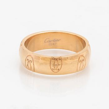 An 18K gold ring "Logo de Cartier" by Cartier.
