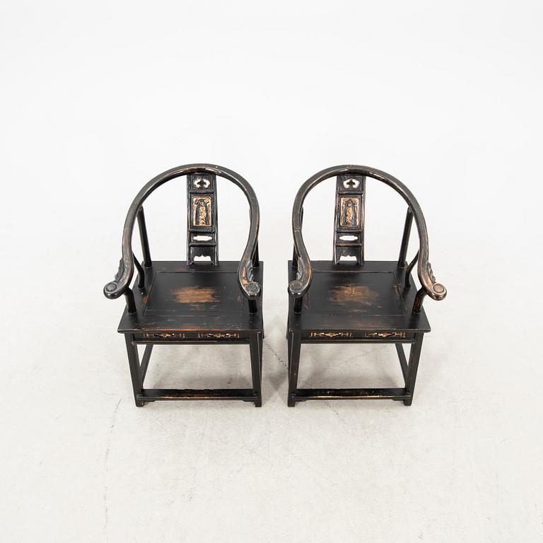 A pair of Chinese armchairs later part of the 20th century.