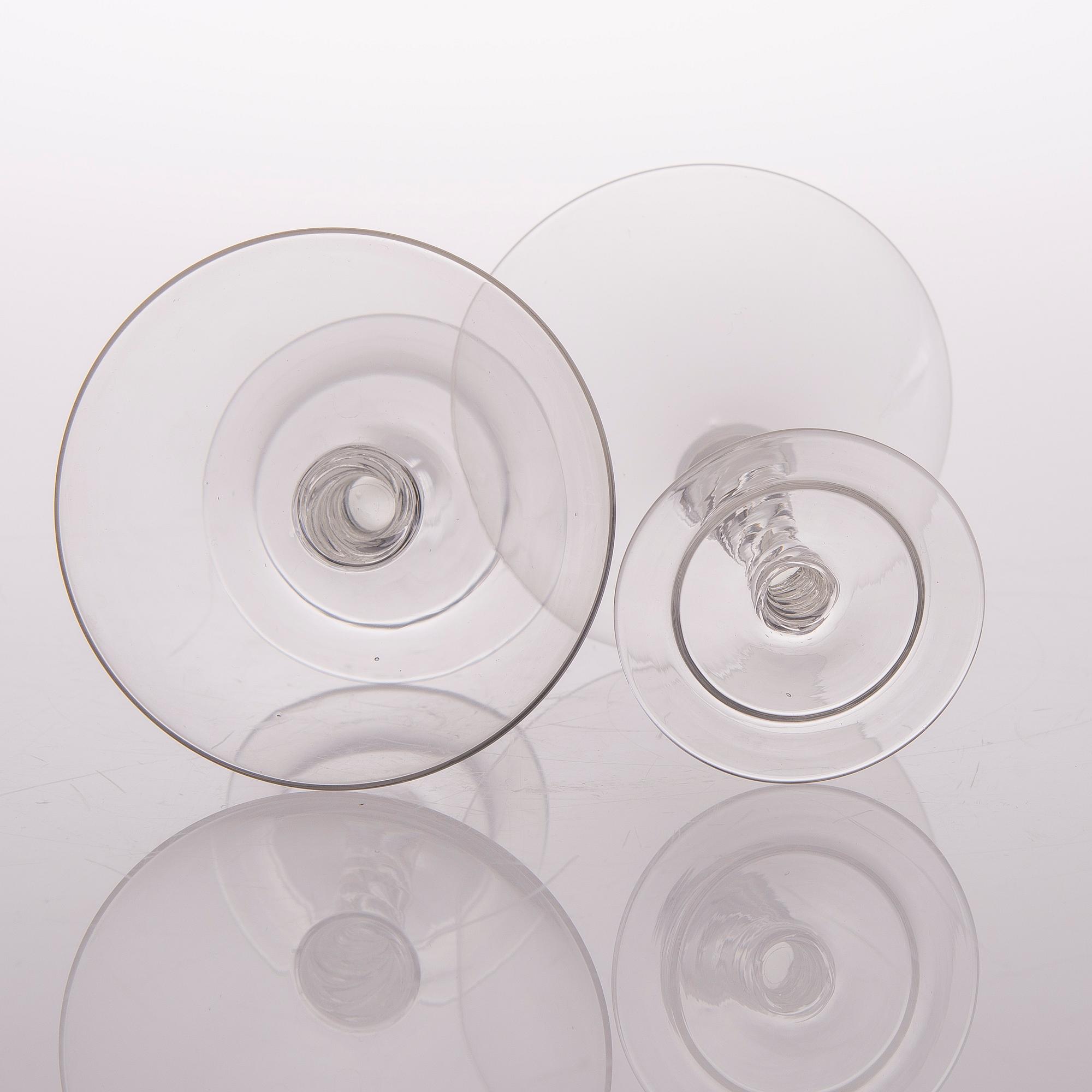 A set of twelve liqueur glasses from the first half of the 20th century.