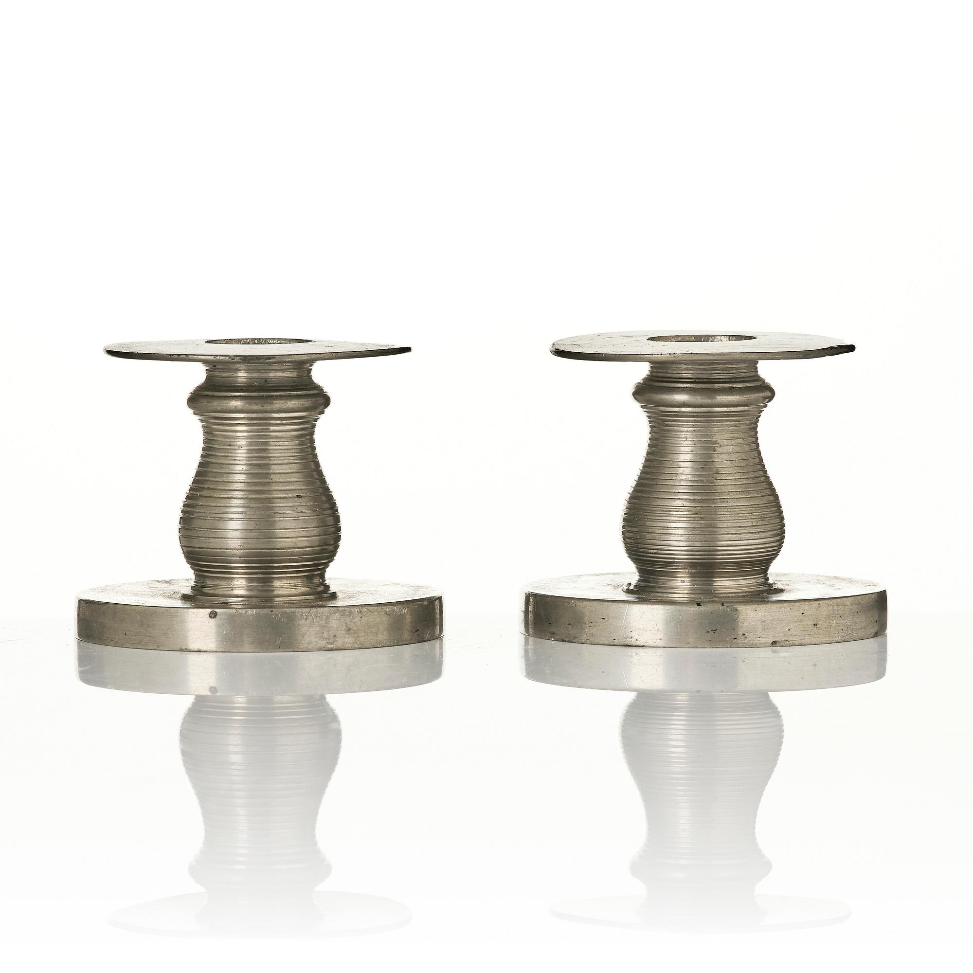 Nils Fougstedt, a pair of candlesticks model 1189, Firma Svenskt Tenn, Stockholm, 1929.