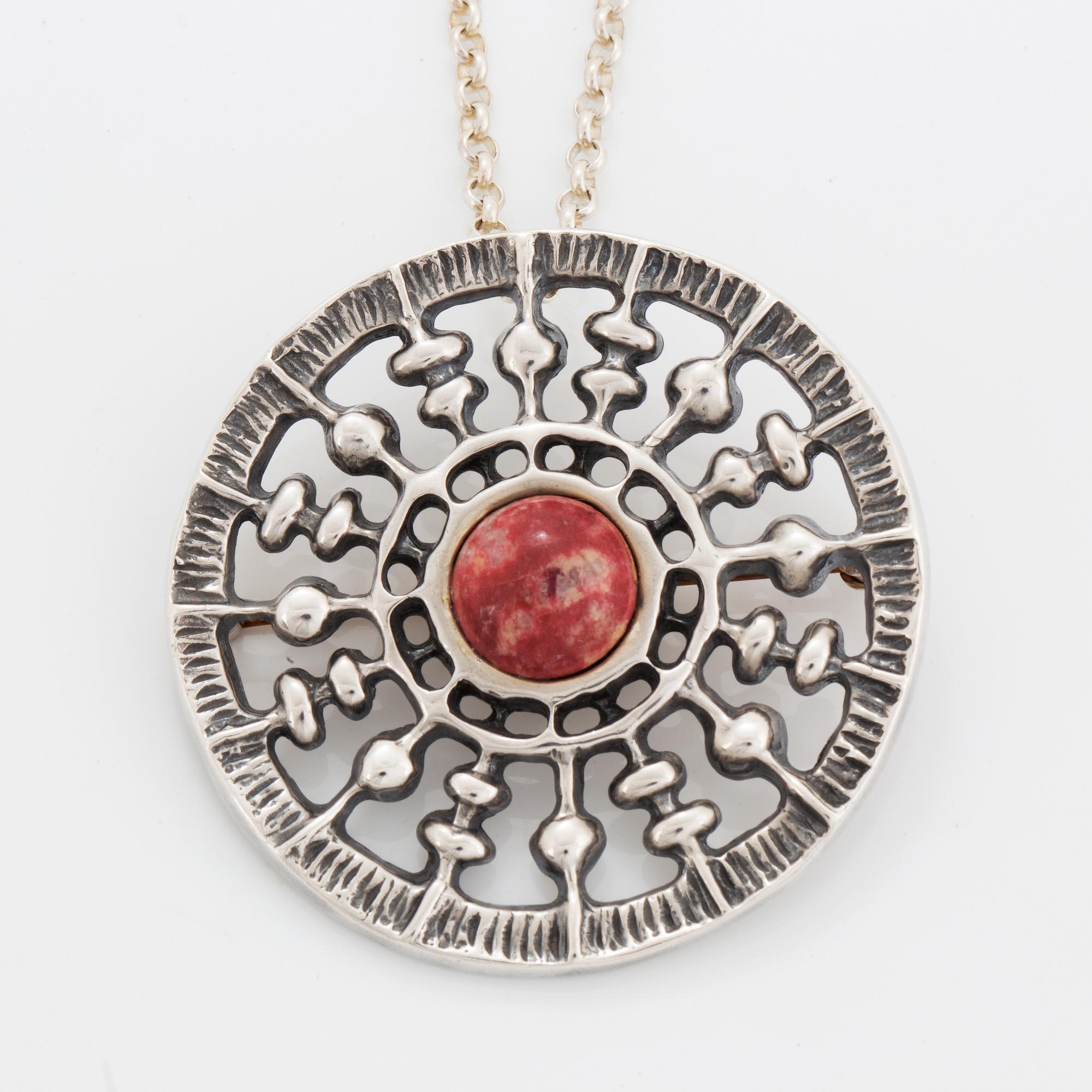 A David Andersen silver pendant.
