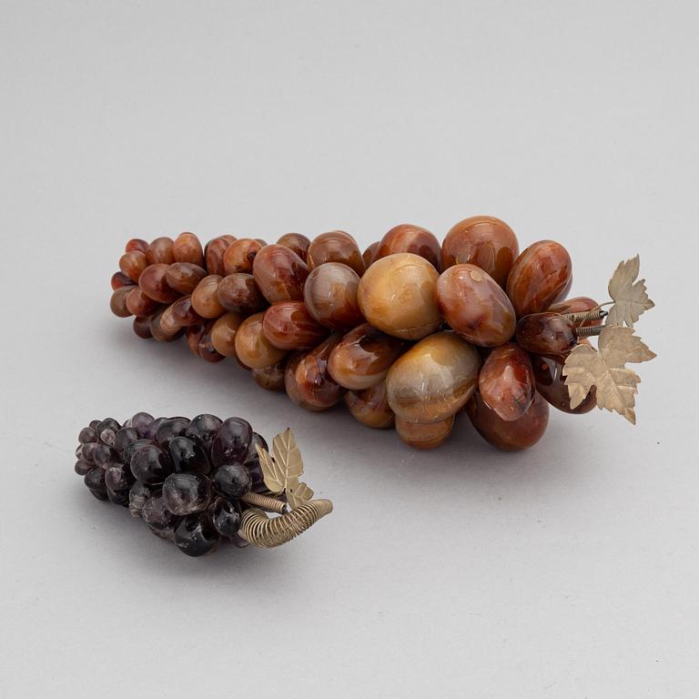 Two agate and quartz grape decorations.