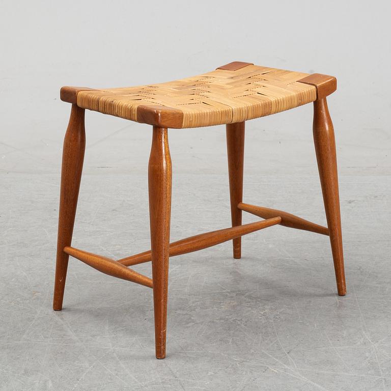 A model '967' mahogany and rattan stool by Josef Frank for Firma Svenskt Tenn.