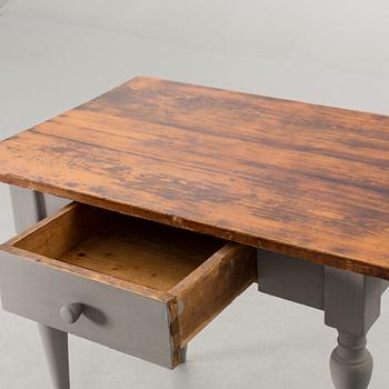 A TABLE WITH DRAW FROM CA 1900.