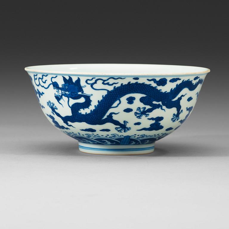 A well painted  blue and white bowl, Qing dynasty, 18th century, with a four character hall mark.