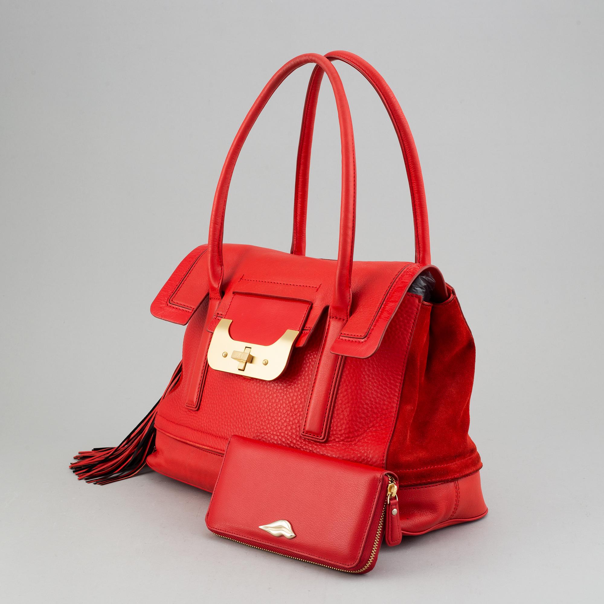 Diane von Fürstenberg a red leather handbag and wallet.