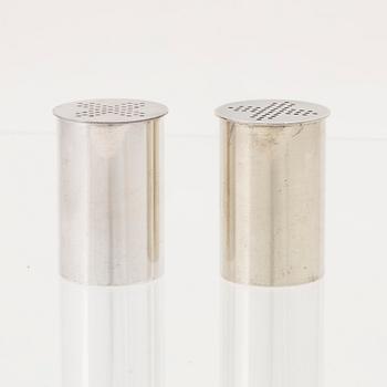 A pair of silver and guilded silver salt and pepper shakers by Wiwen Nilsson, Lund 1957-58.