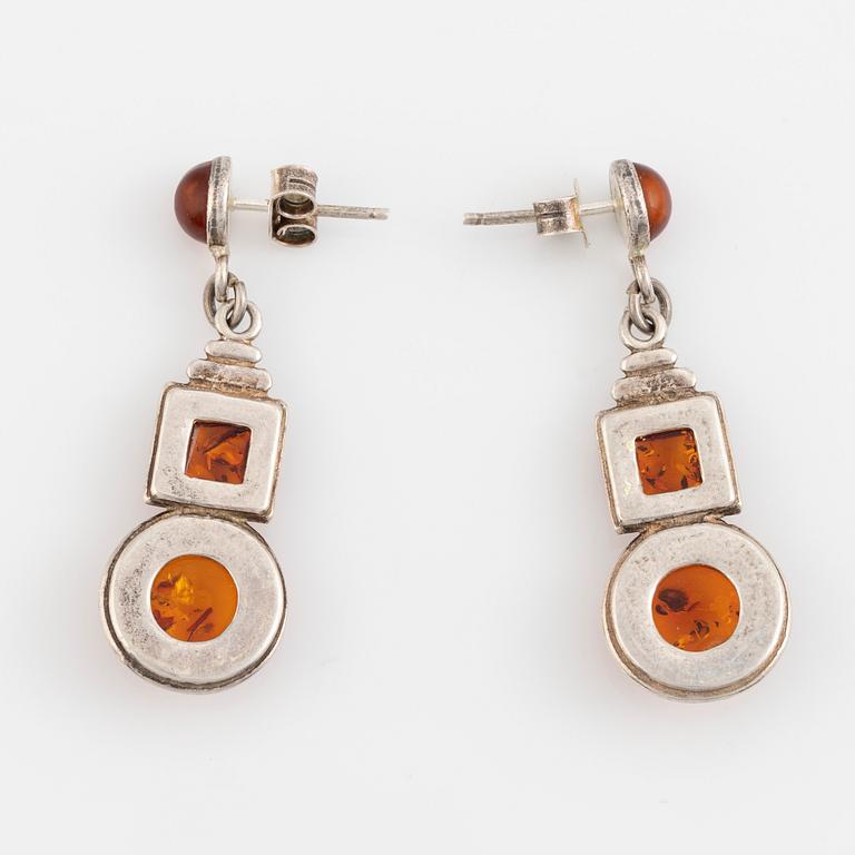 Silver and amber bracelet and earrings.