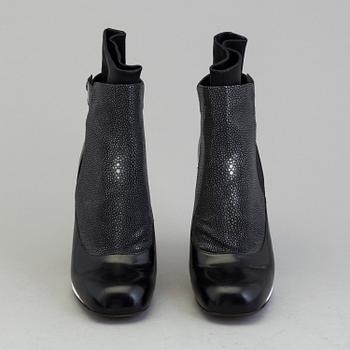 a pair of boots by Fendi.