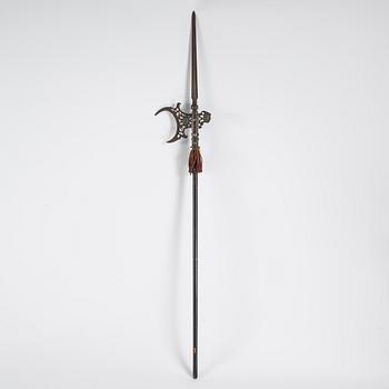 Two swords, shield  and a halberd, late 19th century.