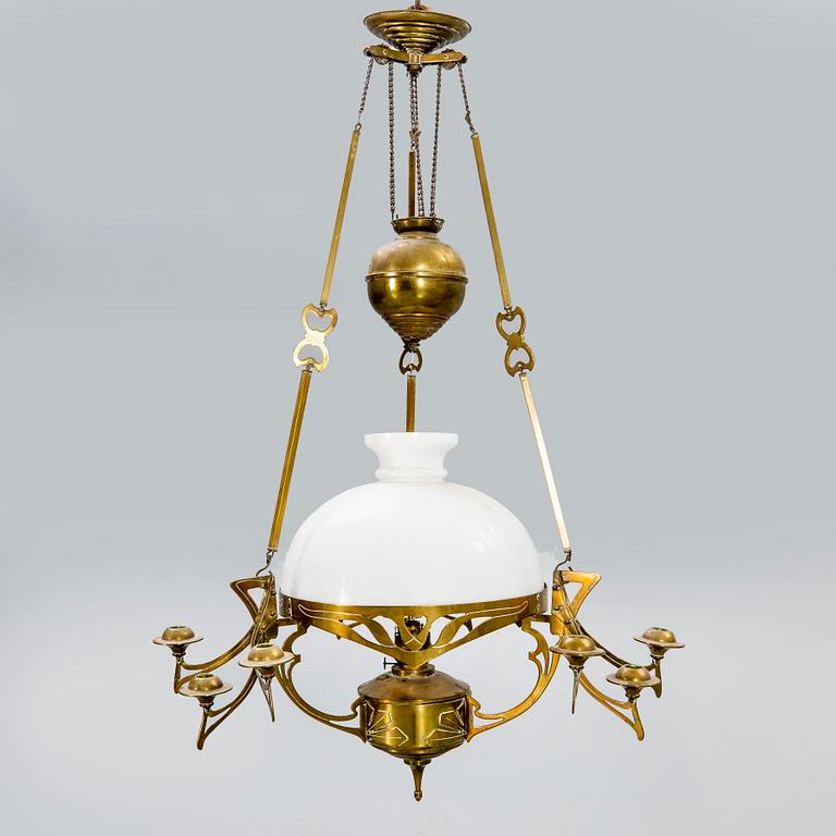 A Jugend brass celing paraffin lamp.