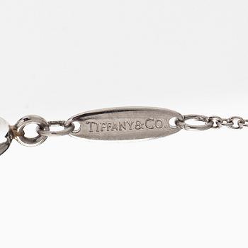Tiffany & Co, Elsa Peretti, a platinum and diamond "Bean" necklace.