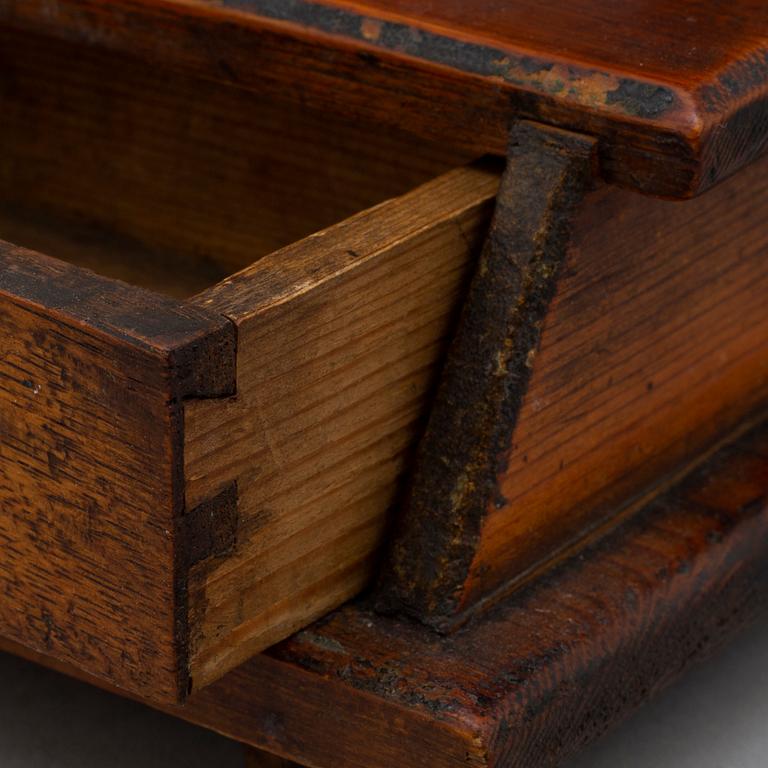 An early 19th century drawer with mirror.